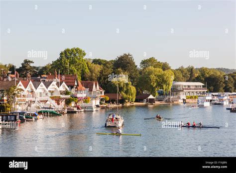 England Oxfordshire Henley On Thames Boathouses And Rowers On River