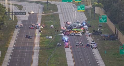 Photos show site of fiery plane crash on I-75 near Naples, Florida