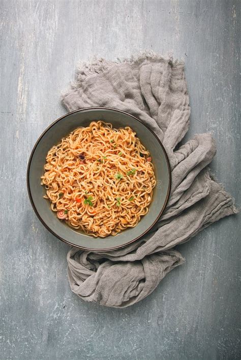 Instant Noodles In A Bowl On A Gray Table Top View No People Stock