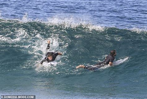 Chris And Liam Hemsworth Hit The Beach In Byron Bay With Bikini Clad Model Gabriella Brooks
