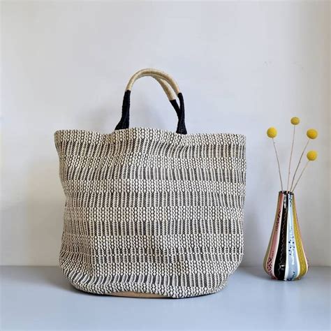 A Large Monochrome Durable Tote Bag With An Easy Relaxed Style