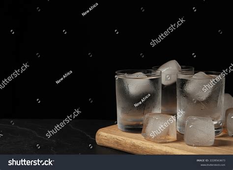 shot glasses vodka ice cubes  stock photo  shutterstock