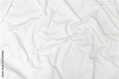 Crumpled white sheet. Textile background. Fabric texture. Natural ...