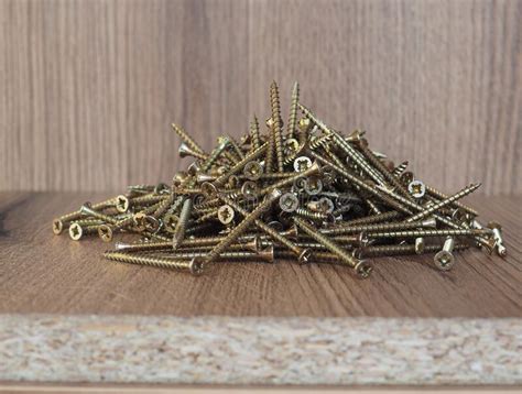 Wood Screws on Manufactured Wood Panel Stock Photo - Image of work ...