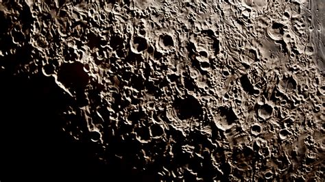 Download Wallpaper 2560x1440 Craters Relief Moon Dark Widescreen 16