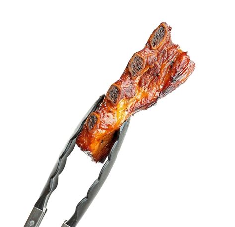 Premium Photo Forceps With Delicious Grilled Ribs On White Background