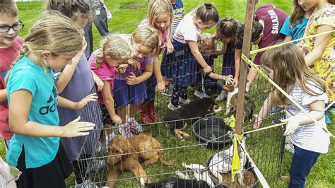 Students From St Johns Lutheran School Check Out Petting Zoo At