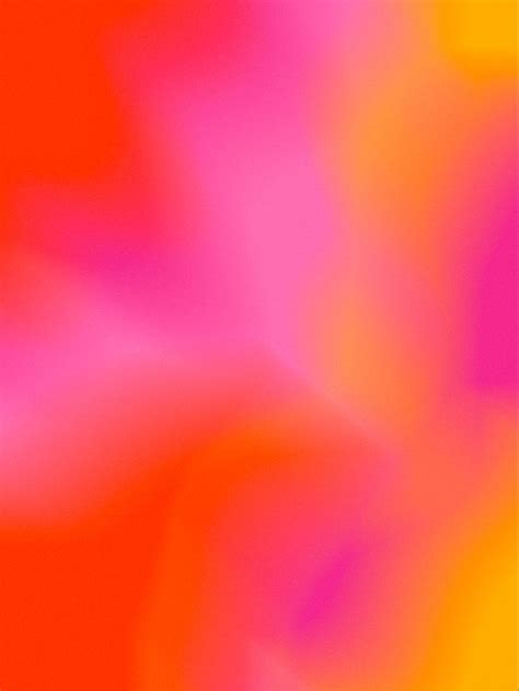 Blurry Image Of An Orange And Pink Flower