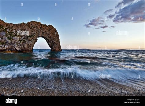 Durdle Door at sunset Stock Photo - Alamy