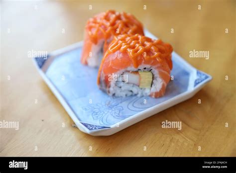 Salmon Egg On Sushi Nigiri Roll Stock Photo Alamy