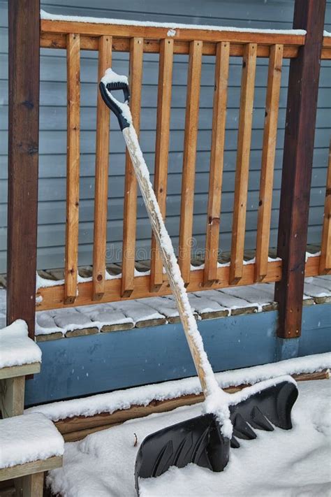 Snow Shovel stock photo. Image of porch, wood, drift - 22685744