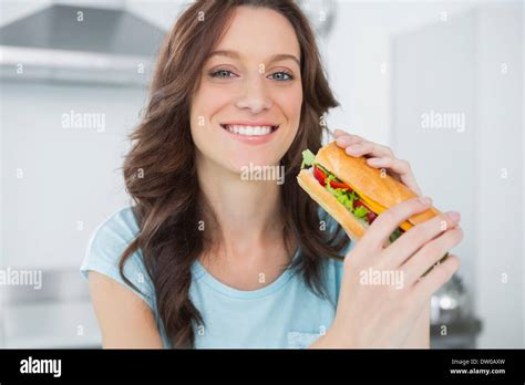 Pretty Brunette Having Sandwich Stock Photo Alamy