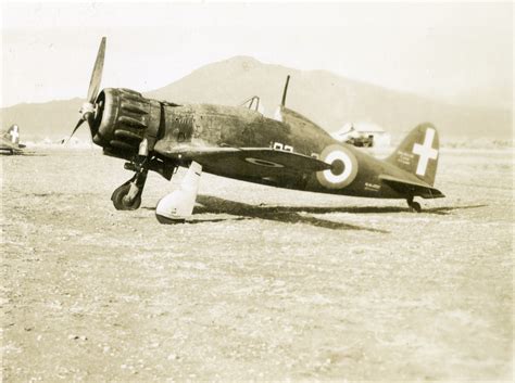 Italian Made Macchi Mc Saetta Fighter Plane Parked In A Field