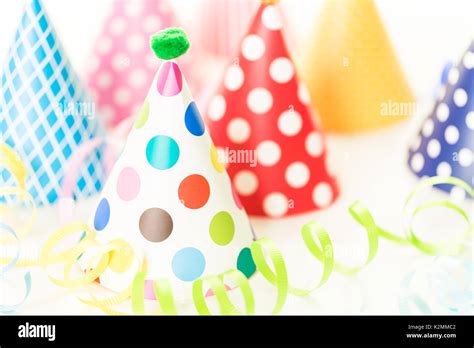 Colorful party hats for kids Birthday Party Stock Photo - Alamy