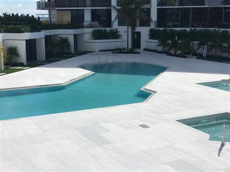 White Marble Pool Deck Decorated Greek Letters