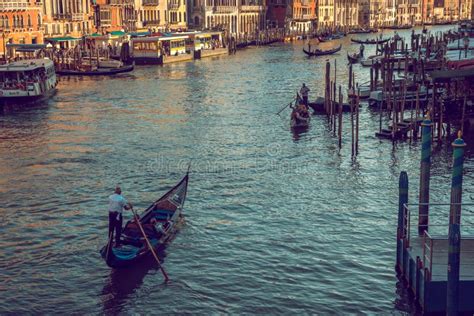 Traditional Gondola On Canal Grande With Basilica Di Santa Maria Della