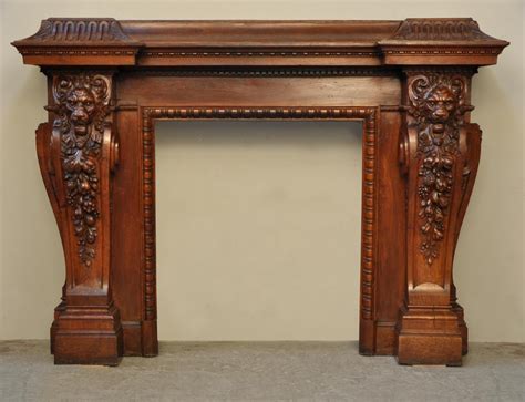 Large Antique Fireplace With Lions Heads Carved Out Of Oak Wood