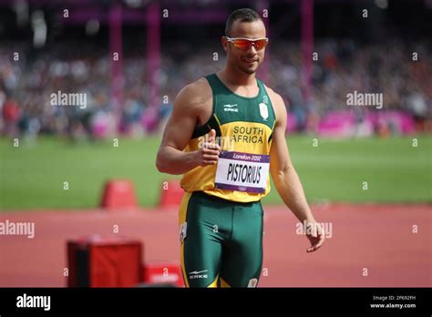 Oscar Pistorius Of South Africa Prepares To Run The In A Round One Heat