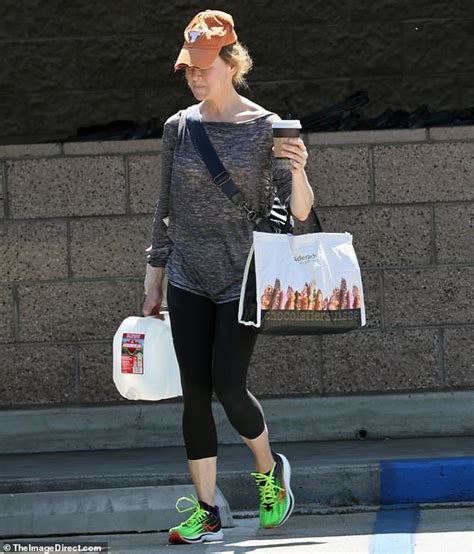 Renee Zellweger Showcases Her Fit Physique In A Pair Of Leggings During