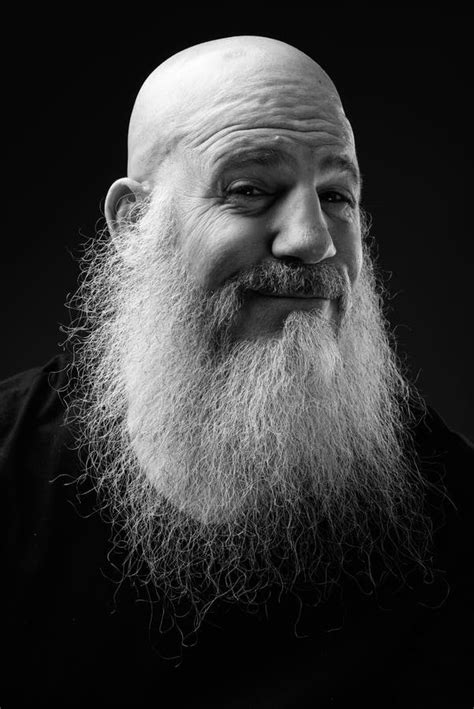 Black And White Portrait Of Mature Bald Man With Long Beard Stock Photo