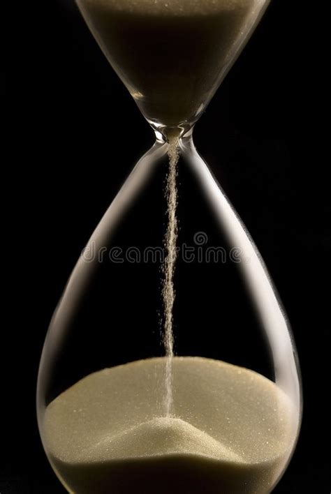 Hourglass An Image Of An Hourglass With The Sand Falling Down And A Black Backg Aff