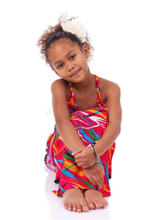 Cute Young African Asian Girl Seated On The Floor Stock Image Image