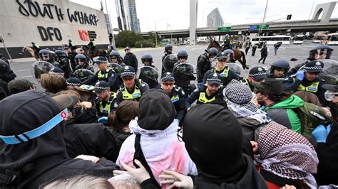 Horse manure, bottles thrown as police and protesters clash outside ...