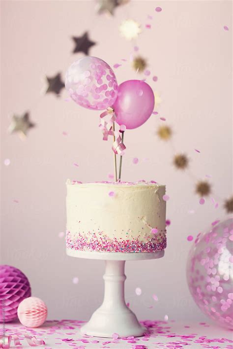 Birthday Cake With Balloons And Confetti | Stocksy United