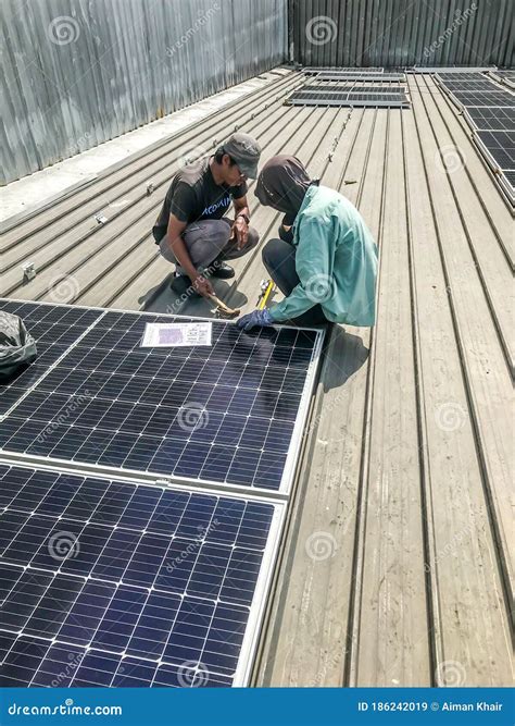 Solar Panel Technician And Engineer Working On Installing Solar Panel