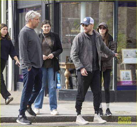 Bridgerton S Phoebe Dynevor Holds Hands With Actor Cameron Fuller In