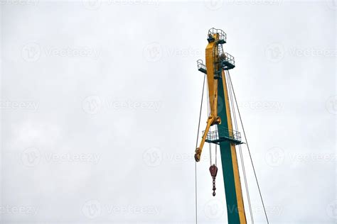 Cargo crane in container ship terminal, container yard 12613755 Stock Photo at Vecteezy