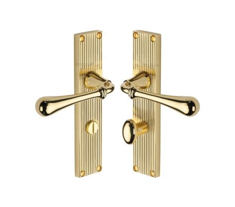 Heritage Brass Roma On Reeded Backplate Polished Brass Door Handles From Handles 4 Homes Ltd Uk