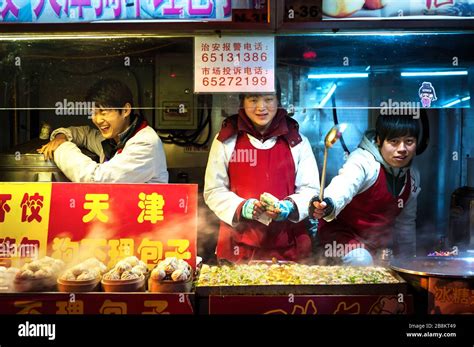 Wangfujing Night Market Beijing Dec 25 2013 Young Snack Vendors