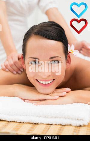 Pretty Brunette Enjoying A Massage Stock Photo Alamy