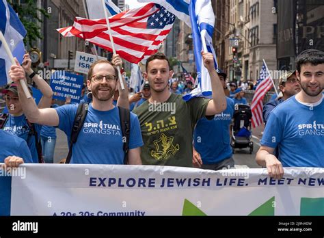 Participants Holding Israeli Flags March Along Fifth Avenue During The Celebrate Israel Parade