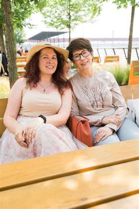 Happy Mature Mother And Her Adult Daughter Enjoying In Conversation While Spending Mother X27 S