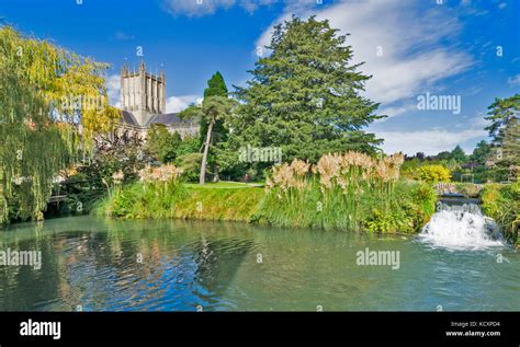 Wells Somerset England The Cathedral A Waterfall And Waters Of The Moat