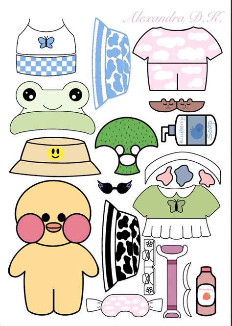 An Assortment Of Paper Dolls With Hats And Other Items