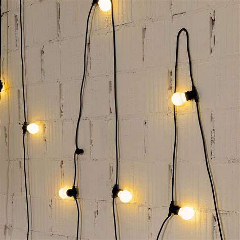 outdoor garland lighting by out there interiors | notonthehighstreet.com