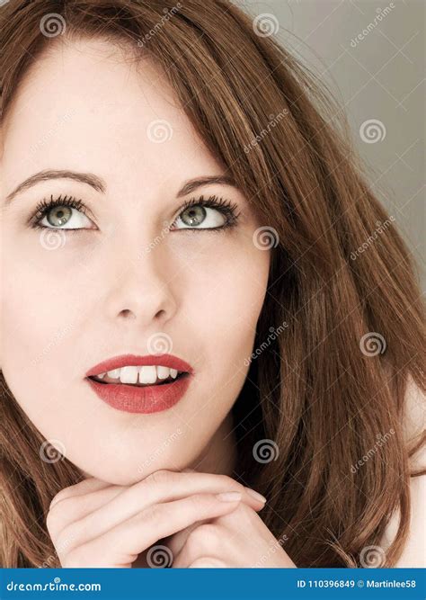 Portrait Of A Happy Smiling Young Woman Looking Pleased And Relaxed