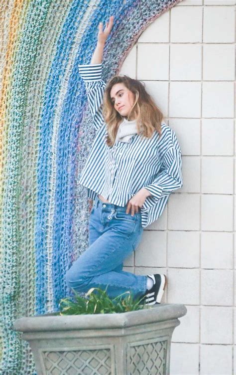 Suki Waterhouse in a Striped Shirt Poses Around Murals and Scenic Spots ...