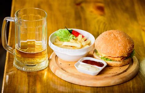 Pub Food And Mug Of Beer Fast Food Concept Burger Menu High Calorie