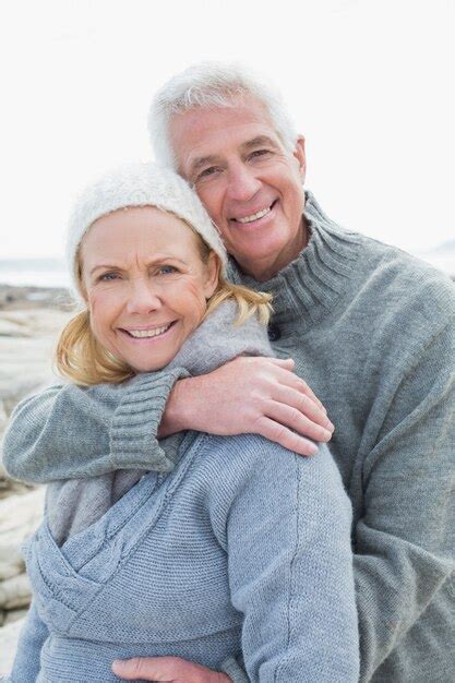 Premium Photo Romantic Senior Couple On Rocky Beach