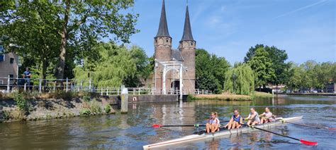 Serene Boating On Delft S Canals Discover Delft With A Tour Guide