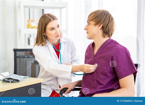 Male Patients Come To See A Female Doctor To Check The Illness Or