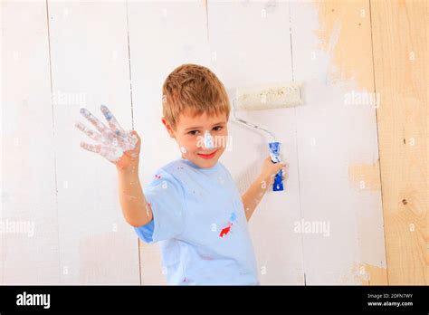 Boy painting, paint, painting Stock Photo - Alamy