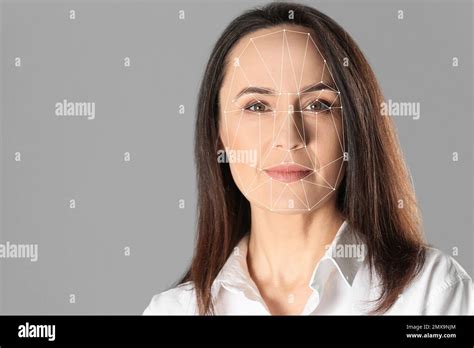 Facial Recognition System Mature Woman With Biometric Identification