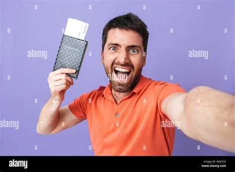 Image Of A Happy Young Handsome Bearded Man Posing Isolated Over Violet