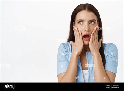 Image Of Shocked Brunette Woman Gasp Open Mouth Startled Holding