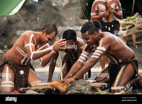 Indigenous Performers Using Traditional Methods To Make Fire Stock